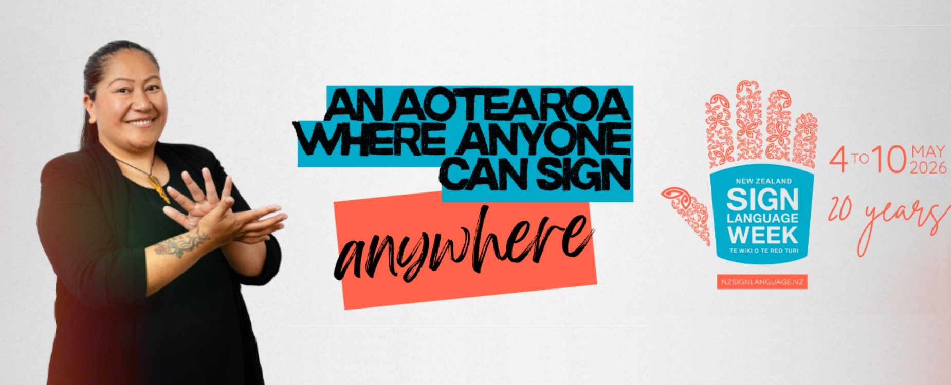 A lady signing and promoting NZSL week